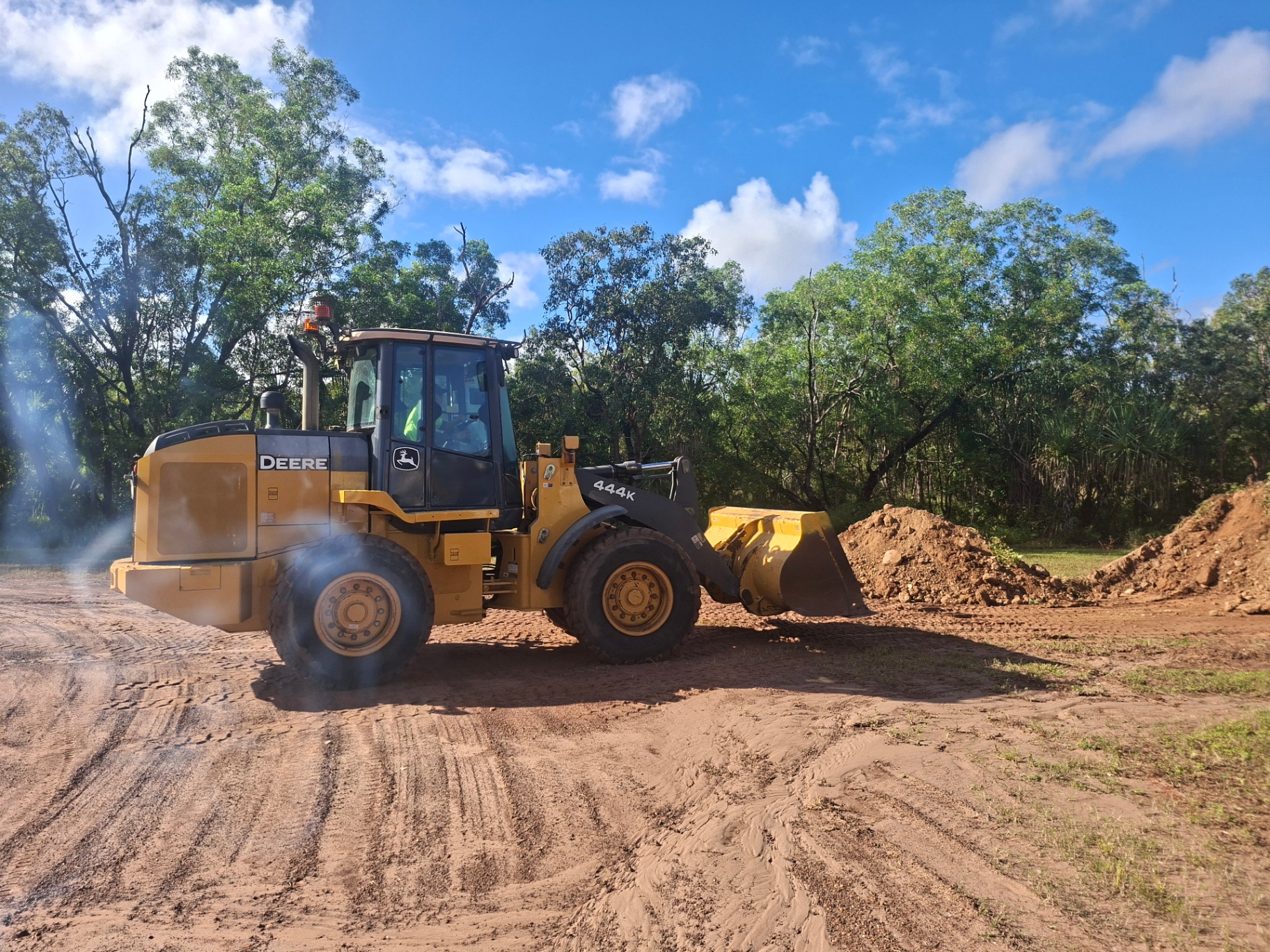 Real Galltan Civil Training front end loader working on red dirt during practical training in Darwin